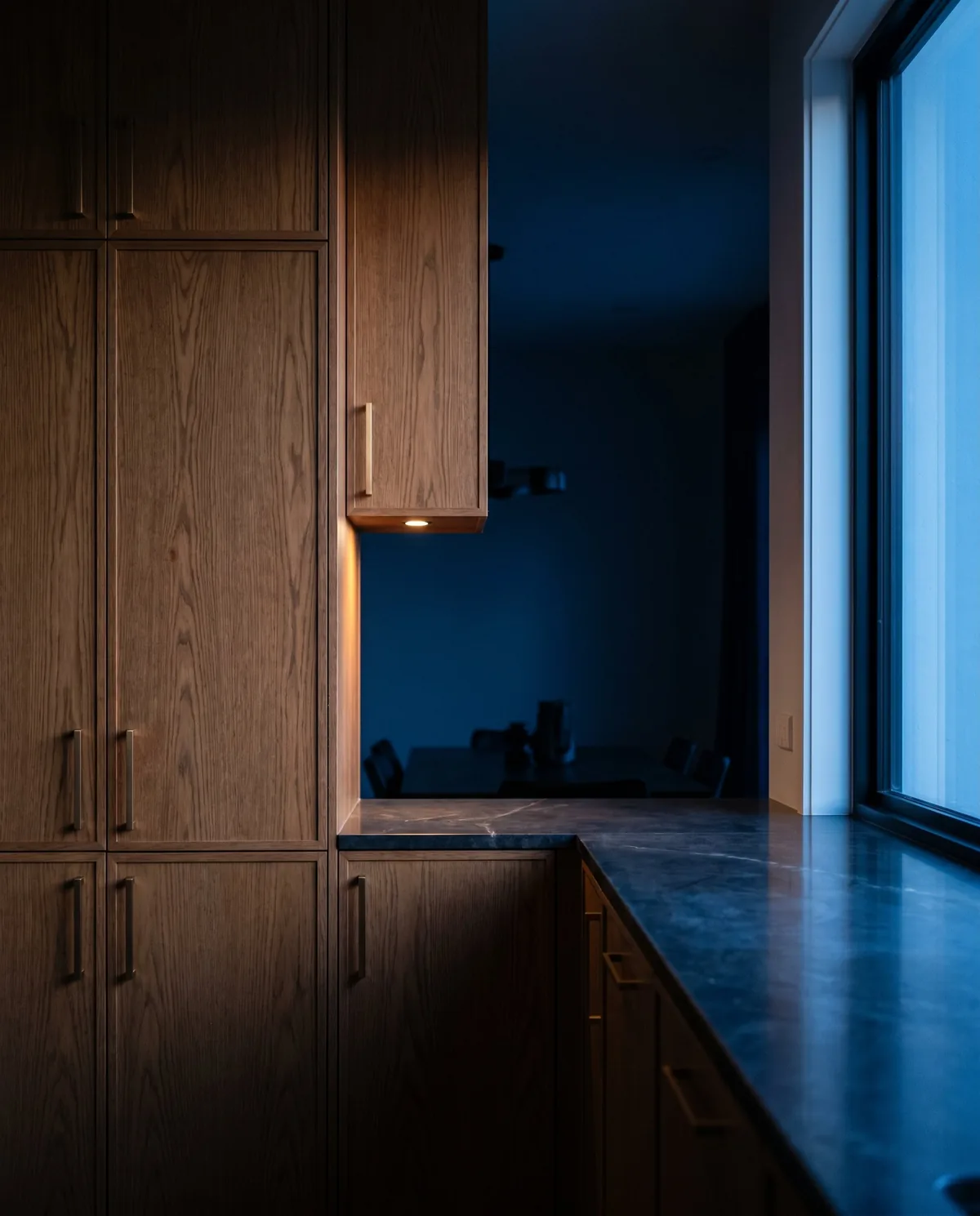 Custom MTY Furniture walk-in wardrobe with warm timber finish